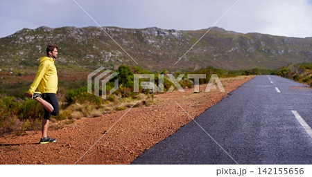 Male runner, stretch and rural road for warm up, running and fitness outdoor in nature with mountain. Active man or athlete in quiet environment for physical recreation and exercise on mockup Male runner, stretch and rural road for warm up, running and fitness outdoor in nature with mountain. Active man or athlete in quiet environment for physical recreation and exercise on mockup 142155656