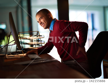 Back pain, stress and businessman with computer in night office for joint, crisis or fibromyalgia disaster. Chair, injury and manager with backache, inflammation or posture, mistake or kidney stones Back pain, stress and businessman with computer in night office for joint, crisis or fibromyalgia disaster. Chair, injury and manager with backache, inflammation or posture, mistake or kidney stones 142155666