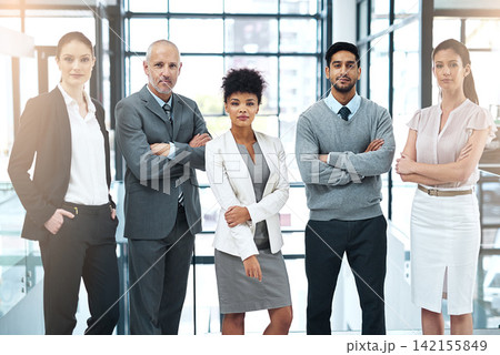 Office, team and portrait of business people with confidence for commitment, leadership and pride. Company, diversity and serious employee with arms crossed for career, partnership and collaboration 142155849