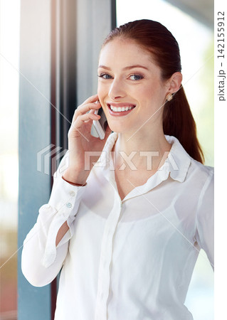 Phone call, portrait and smile with business woman at window in office for communication or networking. Face, mobile and negotiation of happy young employee in workplace for conversation or planning Phone call, portrait and smile with business woman at window in office for communication or networking. Face, mobile and negotiation of happy young employee in workplace for conversation or planning 142155912