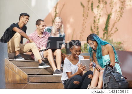 Tablet, education and students happy on university or college campus together for learning or study. People, smile or collaboration on school project for support, communication and diversity Tablet, education and students happy on university or college campus together for learning or study. People, smile or collaboration on school project for support, communication and diversity 142155952