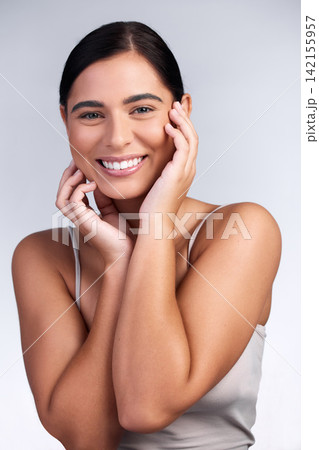 Beauty, portrait and woman with happiness in skincare, dermatology and mockup in studio background. Confidence, model and girl with self care for skin, facial cosmetics or healthy texture on face Beauty, portrait and woman with happiness in skincare, dermatology and mockup in studio background. Confidence, model and girl with self care for skin, facial cosmetics or healthy texture on face 142155957