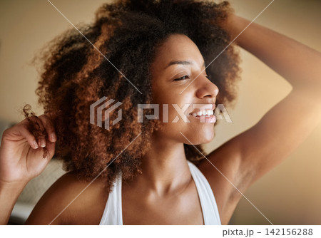 Home, morning and black woman stretching, peace and happiness with weekend break, calm and stress relief. Bedroom, apartment and African person with wellness, fresh and smile with healthy routine Home, morning and black woman stretching, peace and happiness with weekend break, calm and stress relief. Bedroom, apartment and African person with wellness, fresh and smile with healthy routine 142156288