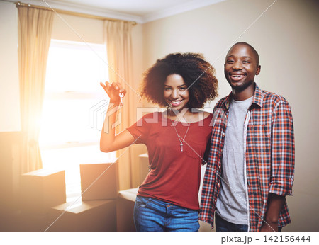 Black couple, real estate and portrait or happy in new house with keys, support or moving day with sunlight. People, homeowner and excited for property investment, dream home or relocation with boxes Black couple, real estate and portrait or happy in new house with keys, support or moving day with sunlight. People, homeowner and excited for property investment, dream home or relocation with boxes 142156444