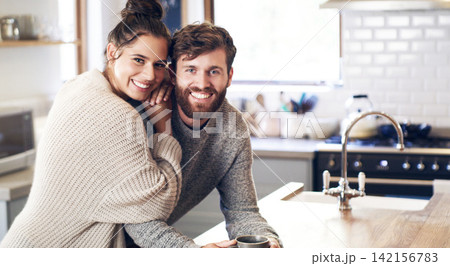 Happy, couple and people in kitchen on portrait, together and support for unity. Relationship, home and smile with bonding for commitment with care, help and trust as soulmate for love on break Happy, couple and people in kitchen on portrait, together and support for unity. Relationship, home and smile with bonding for commitment with care, help and trust as soulmate for love on break 142156783