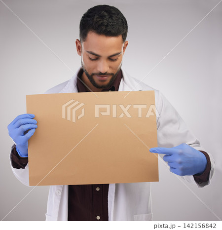 Sign, man and doctor pointing at poster for healthcare, advertising or mockup isolated on white studio background. Scientist, banner or medical professional on board to show blank space for marketing Sign, man and doctor pointing at poster for healthcare, advertising or mockup isolated on white studio background. Scientist, banner or medical professional on board to show blank space for marketing 142156842