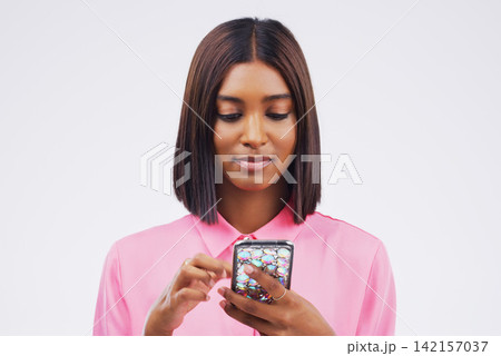 Woman, smartphone and typing by white background for internet with web connection, social media and online scroll. Female person, mobile and web news by studio backdrop with contact and reading sms Woman, smartphone and typing by white background for internet with web connection, social media and online scroll. Female person, mobile and web news by studio backdrop with contact and reading sms 142157037