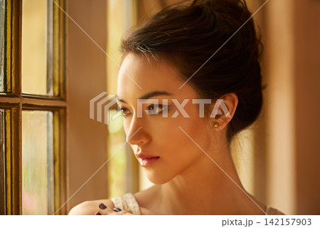 Beauty, thinking and woman in elegant home for gala event in style, classy outfit and formal clothes. Window, aesthetic and person with confidence, pride and luxury in vintage manor, house or mansion Beauty, thinking and woman in elegant home for gala event in style, classy outfit and formal clothes. Window, aesthetic and person with confidence, pride and luxury in vintage manor, house or mansion 142157903