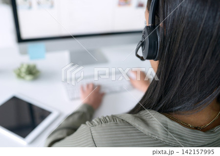 Call center, computer and woman with headphone typing for help desk, customer care or technical support. Headset, female consultant or telemarketer in office for crm, contact us and communication Call center, computer and woman with headphone typing for help desk, customer care or technical support. Headset, female consultant or telemarketer in office for crm, contact us and communication 142157995