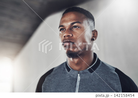 Tough, thinking and man with fitness, exercise and runner with confidence and progress with workout. African person, athlete and guy with endurance and serious face with sports, mindset and hobby Tough, thinking and man with fitness, exercise and runner with confidence and progress with workout. African person, athlete and guy with endurance and serious face with sports, mindset and hobby 142158454