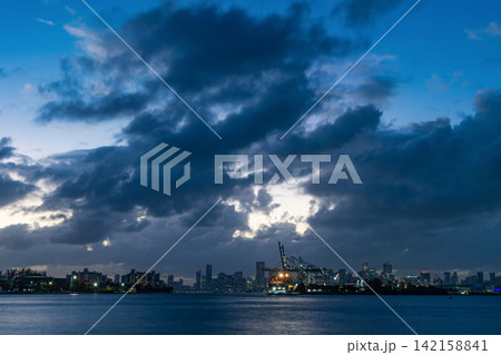 Miami South beach landscape at night. Aerial Miami skyscraper. Miami beach and cityscape. Luxurious lifestyle. Cityscape landscape. Florida panorama. Skyscraper architecture of Miami Miami South beach landscape at night. Aerial Miami skyscraper. Miami beach and cityscape. Luxurious lifestyle. Cityscape landscape. Florida panorama. Skyscraper architecture of Miami 142158841