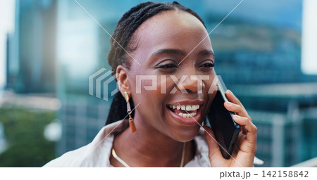 Black woman, phone call and business discussion in city, balcony or rooftop for outdoor communication. Face of African female person or employee talking on mobile smartphone for conversation in town Black woman, phone call and business discussion in city, balcony or rooftop for outdoor communication. Face of African female person or employee talking on mobile smartphone for conversation in town 142158842