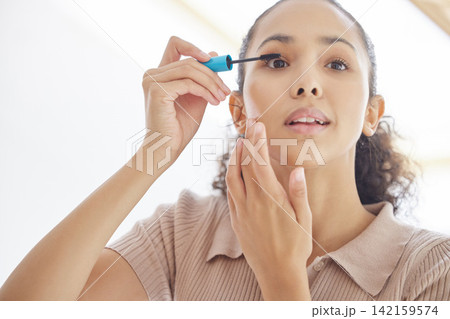 Makeup, woman and mascara brush in home for skincare, beauty or facial treatment in bathroom. Apply cosmetics, eyelashes and girl with product for morning routine, health and grooming to prepare Makeup, woman and mascara brush in home for skincare, beauty or facial treatment in bathroom. Apply cosmetics, eyelashes and girl with product for morning routine, health and grooming to prepare 142159574