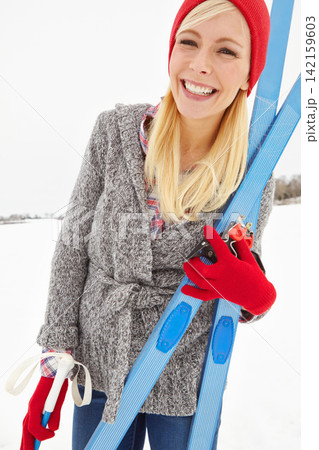 Girl, portrait and happy on vacation with snowboard for alpine adventure, fun and exploring snowy wilderness. Woman, ski equipment and outdoor on winter holiday in Alaska for getaway and travel tour. Girl, portrait and happy on vacation with snowboard for alpine adventure, fun and exploring snowy wilderness. Woman, ski equipment and outdoor on winter holiday in Alaska for getaway and travel tour. 142159603