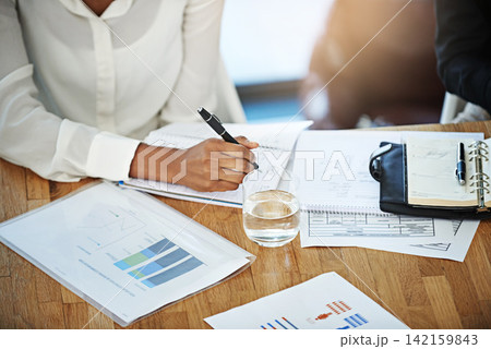 Business hands, documents and data analysis for finance, bookkeeping and company revenue, growth or increase. Professional people writing notes, brainstorming or planning budget in accounting meeting 142159843