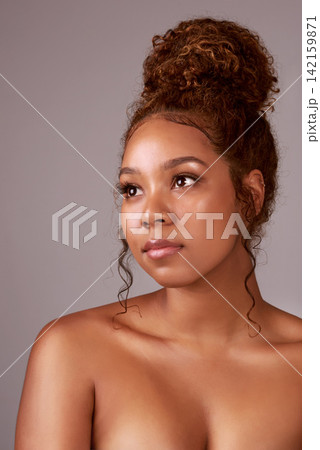 Woman, face and skincare and natural beauty in studio with glowing skin, facial treatment and dermatology. Cosmetics, model and person with confidence, healthy hair and self care on background Woman, face and skincare and natural beauty in studio with glowing skin, facial treatment and dermatology. Cosmetics, model and person with confidence, healthy hair and self care on background 142159871