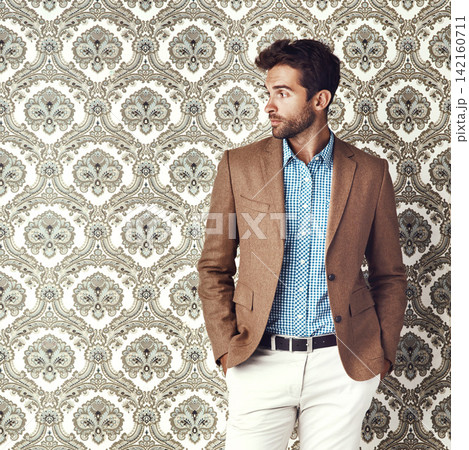 Man, thinking and fashion suit in studio, designer outfit and style on wallpaper background. Male person, professional and creative designer for trend or aesthetic, confident and gentleman in blazer Man, thinking and fashion suit in studio, designer outfit and style on wallpaper background. Male person, professional and creative designer for trend or aesthetic, confident and gentleman in blazer 142160711