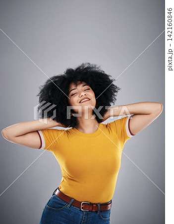Woman, clothes and afro of fashion, relax and smile for tshirt, stylish and confidence of girl. Aesthetic, happy and female person in dark background, pride and hair for model, cheerful and studio Woman, clothes and afro of fashion, relax and smile for tshirt, stylish and confidence of girl. Aesthetic, happy and female person in dark background, pride and hair for model, cheerful and studio 142160846
