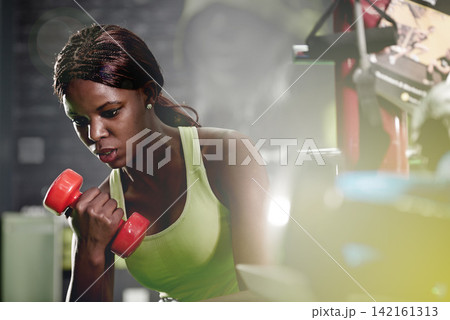 Gym, African girl or weight as strength, fitness or health by training, exercise or workout. Fit, confident or black woman in flex, muscle or breath as power, performance or self care for wellness Gym, African girl or weight as strength, fitness or health by training, exercise or workout. Fit, confident or black woman in flex, muscle or breath as power, performance or self care for wellness 142161313
