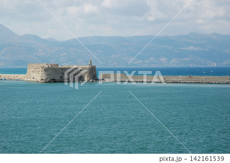 Distant view of Koules Fortress and harbor pier in Heraklion Greece Distant view of Koules Fortress and harbor pier in Heraklion Greece 142161539