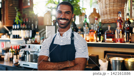 Welcome, coffee shop and confident portrait of man at bar with smile, waiter or manager at restaurant startup. Bistro, service barman and happy small business owner at cafe counter with arms crossed. 142161886