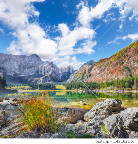 Fabulous view of Fusine lake with Mangart peak on background. 142162116