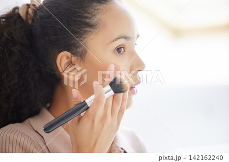 Face, beauty and woman with makeup brush in home for skincare, health or treatment in bathroom. Cosmetics, product and girl with foundation, blush and apply powder for contour in house on mockup 142162240