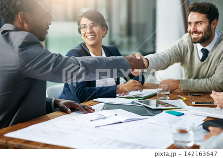 Team, handshake and agreement in office for business, development and project management in corporate with tech. Group, businesspeople and paperwork for promotion, collaboration and welcome at work Team, handshake and agreement in office for business, development and project management in corporate with tech. Group, businesspeople and paperwork for promotion, collaboration and welcome at work 142163647