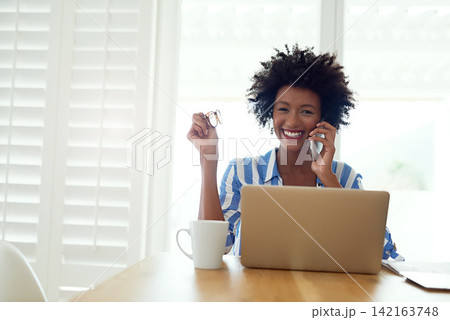 Black woman, laptop or phone call with portrait in home for career, graphic designer or entrepreneur. Female person, startup or business with computer and mobile for web development or remote work Black woman, laptop or phone call with portrait in home for career, graphic designer or entrepreneur. Female person, startup or business with computer and mobile for web development or remote work 142163748
