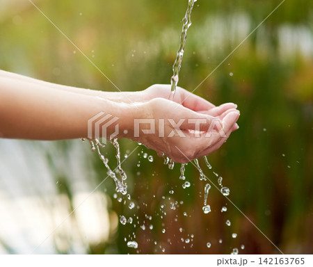 Hands, fresh water and stream with splash or serenity with calm in outdoors with palm. Wellness, spring and sunshine with health or clean river with respect for nature with spirituality at lake Hands, fresh water and stream with splash or serenity with calm in outdoors with palm. Wellness, spring and sunshine with health or clean river with respect for nature with spirituality at lake 142163765