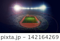 Illuminated Football Stadium Under Night Sky 142164269