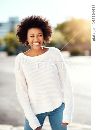 Road, girl and smile in street, black woman and afro in urban, fashion and natural hair. Winter wear, city and laughter or travel, outdoor and confident in cheerful, vacation and adventure Road, girl and smile in street, black woman and afro in urban, fashion and natural hair. Winter wear, city and laughter or travel, outdoor and confident in cheerful, vacation and adventure 142164458