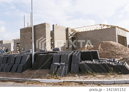 House, building and real estate project for construction, development and dream home renovation. Property, brick wall and architecture with structure, worksite and suburban improvement and design 142165152