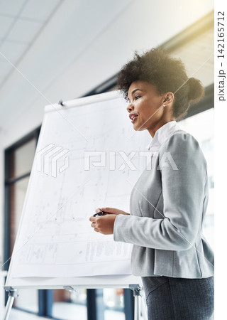 Business woman, coach and presentation with Flipchart for seminar or teaching in boardroom at office. Female person or presenter talking with whiteboard for corporate discussion or plan at workplace 142165712