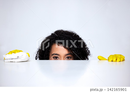 Cleaning, kitchen counter and portrait of woman with gloves for hygiene, disinfection or sanitary in home. Maintenance, housekeeping and domestic worker with cloth for shine, germs or wash furniture Cleaning, kitchen counter and portrait of woman with gloves for hygiene, disinfection or sanitary in home. Maintenance, housekeeping and domestic worker with cloth for shine, germs or wash furniture 142165901