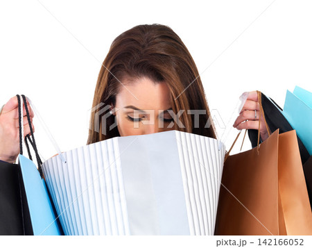 Woman, checking and shopping with bags for clothes, fashion and luxury in studio. Female person, looking and retail for style, designer and sale on isolated white background with mockup in store Woman, checking and shopping with bags for clothes, fashion and luxury in studio. Female person, looking and retail for style, designer and sale on isolated white background with mockup in store 142166052