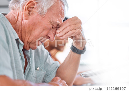 Stress, headache and mature business man with worry for problem, crisis and frustrated in office. Mental health, professional and person with migraine, burnout and anxiety for work, career and job Stress, headache and mature business man with worry for problem, crisis and frustrated in office. Mental health, professional and person with migraine, burnout and anxiety for work, career and job 142166197