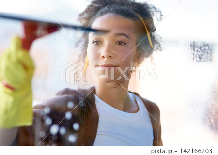 Home, cleaning window and woman with hotel worker, remove bacteria and foam with tools and housekeeper. Maid, employee and girl with equipment, glass and cleaning service with maintenance and job 142166203