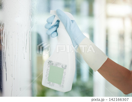 Person, cleaner and window with spray bottle for disinfection, housekeeping or cleaning service at home. Closeup of maid with gloves and logo on chemical liquid on glass for hygiene or bacteria Person, cleaner and window with spray bottle for disinfection, housekeeping or cleaning service at home. Closeup of maid with gloves and logo on chemical liquid on glass for hygiene or bacteria 142166307