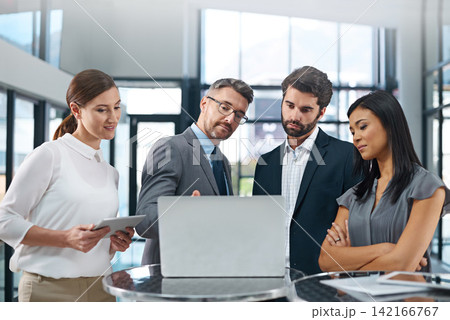 Conversation, people and meeting in office with laptop for business report or online growth with information sharing. Manager, employees and paperwork to show review, corporate and careers in sales. Conversation, people and meeting in office with laptop for business report or online growth with information sharing. Manager, employees and paperwork to show review, corporate and careers in sales. 142166767