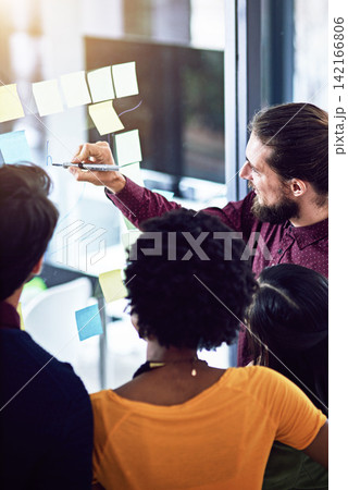 Businessman, glass and write to coach in office, teamwork and idea for solution with sticky notes. High angle, male person and schedule for problem solving, support and mentor for project brainstorm Businessman, glass and write to coach in office, teamwork and idea for solution with sticky notes. High angle, male person and schedule for problem solving, support and mentor for project brainstorm 142166806