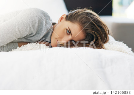 Home, morning and portrait of woman in bed for relaxing, resting and wake up from sleep in bedroom. wellness, house and face of person with cosy blanket on weekend, vacation and break for comfort 142166888