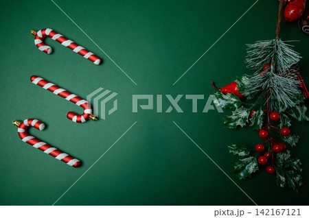 Green Background New Year Still Life with Ornaments and Text Area Green Background New Year Still Life with Ornaments and Text Area 142167121