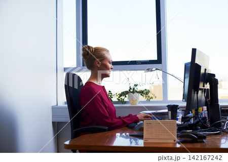 Business woman, typing and working on computer at office desk for planning and email management. Secretary, worker or employee on desktop for online workflow and productivity or busy by calendar 142167242