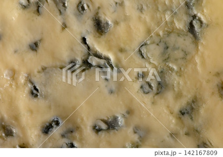 Delicious blue cheese with rich flavors and creamy texture invites taste exploration in a culinary delight Delicious blue cheese with rich flavors and creamy texture invites taste exploration in a culinary delight 142167809