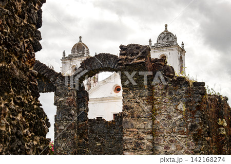 Facade and towers of an old Baroque church 142168274