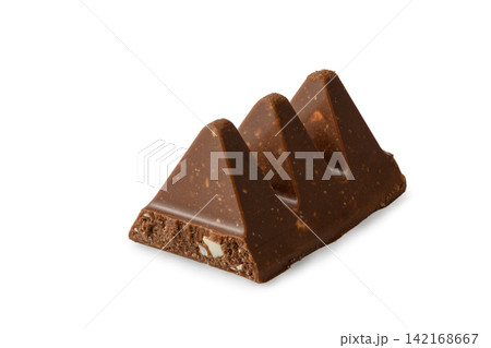 Three triangular pieces of milk chocolate with nougat and almonds isolated on a white background 142168667