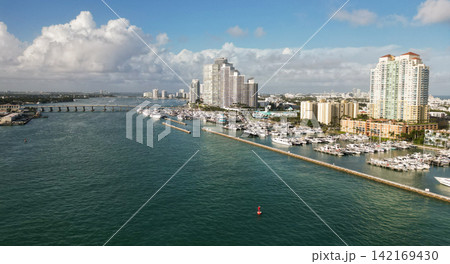 Summer vacation. Luxury South beach marina. Miami south beach view. Docked luxurious yacht boat. Luxurious lifestyle. View of luxury Miami Biscayne Bay Florida. Biscayne bay. Marina view 142169430