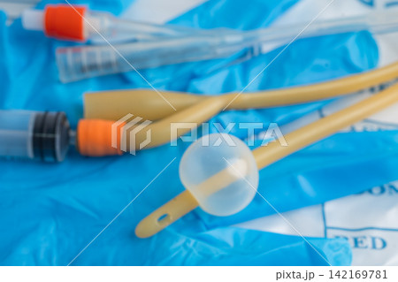 Foley catheter and urine drainage bag collect urine for disability or patient in hospital. Foley catheter and urine drainage bag collect urine for disability or patient in hospital. 142169781