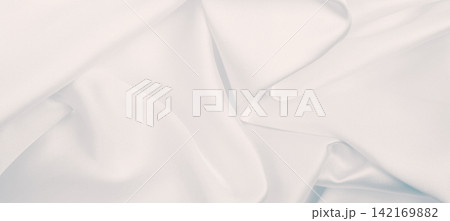 Smooth elegant grey silk or satin luxury cloth as wedding background. Luxurious Christmas background or New Year background design Smooth elegant grey silk or satin luxury cloth as wedding background. Luxurious Christmas background or New Year background design 142169882